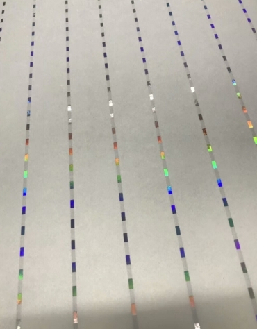 Security paper sheet with multiple colour-shifting security threads